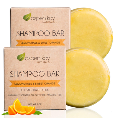 Natural Aspen Kay Naturals solid shampoo bar with organic ingredients, showing the rectangular soap with a textured surface.