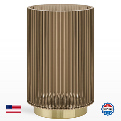 Torre & Tagus brown glass vase with ribbed design, ideal for flowers, in a hurricane-style decorative piece.