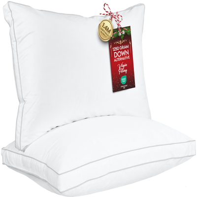 Set of two Utopia Bedding king size white bed pillows, soft, fluffy, suitable for comfortable sleeping.