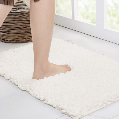 Walensee ivory non-slip bathroom rug, 32x20 inches, water-absorbent bath mat with textured surface for safe, comfortable use.
