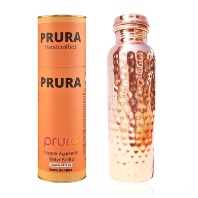 Hammered copper water bottle by Unbranded, traditional Ayurvedic pure copper vessel for storing and drinking water.