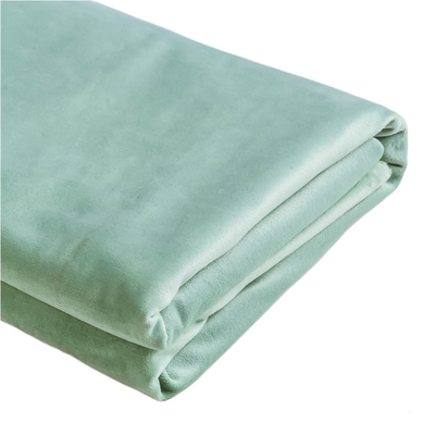 Light-colored velvet upholstery fabric by TinaKim, perfect for bench seat repairs and DIY furniture projects.