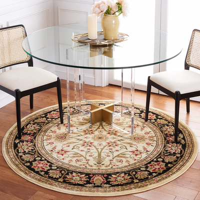Safavieh Lyndhurst round area rug featuring ivory and black traditional design with intricate patterns.