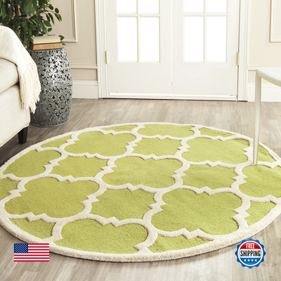 Safavieh Cambridge Collection 6' round Moroccan rug with green and ivory handmade geometric patterns on woven surface