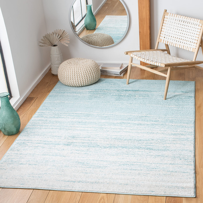 Safavieh Adirondack collection 6x9 aqua ivory modern ombre area rug with gradient design and soft textured surface.
