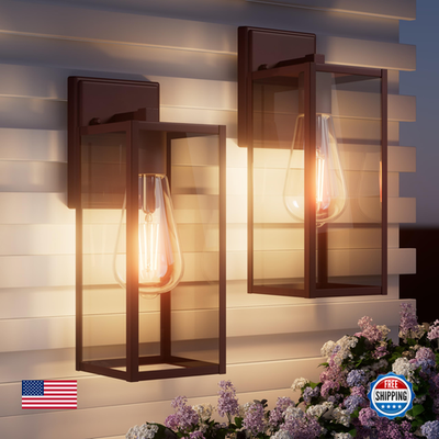 Pair of outdoor front porch lights with oil rubbed bronze finish, wall-mounted fixtures for exterior illumination.