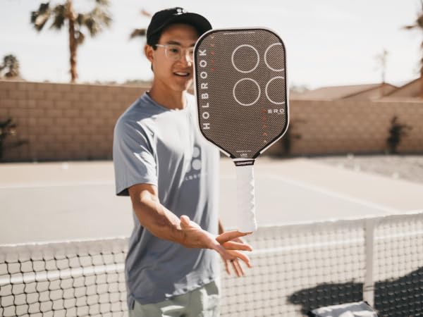 Holbrook Aero Series Edgeless Pickleball Paddle with carbon fiber surface, USAPA approved, showing the sleek design and ergonomic handle.