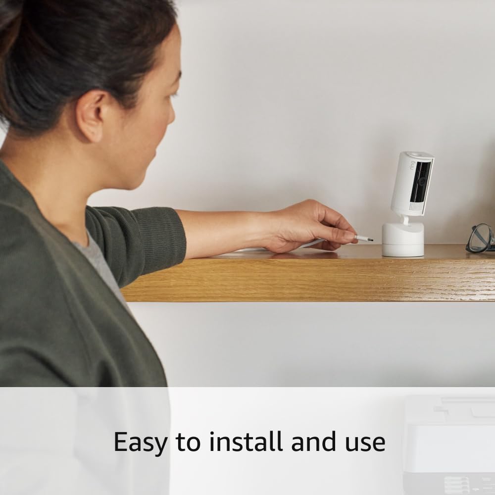 Ring Ring Pan-Tilt Indoor Camera in black with 360° coverage, HD video, and two-way talk for home or business surveillance.