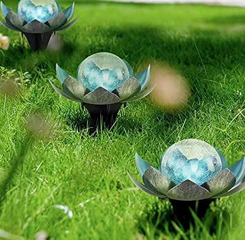 QZHP Lotus solar outdoor garden light with waterproof solar LED design illuminating a garden pathway at night