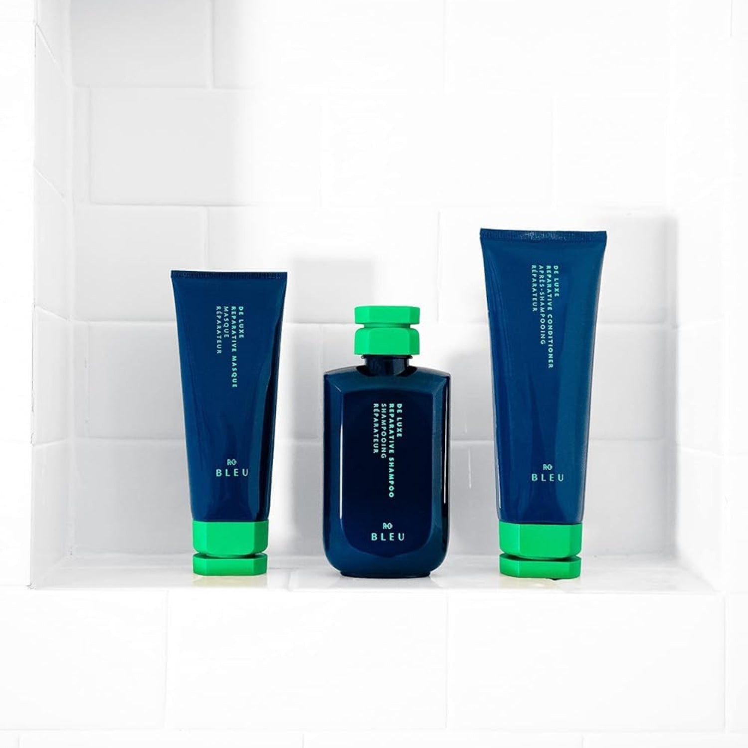 Elefair R+Co BLEU De Luxe Reparative Shampoo bottle showing hydrating and strengthening formula for damaged hair.