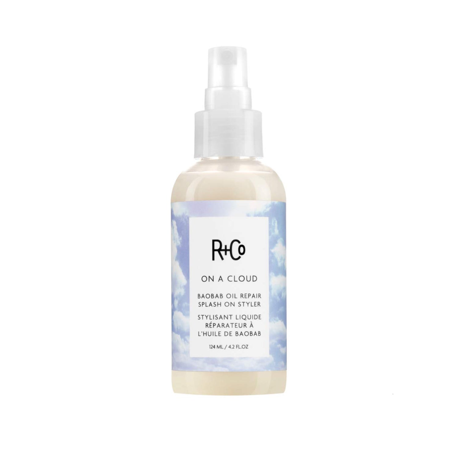 R+Co On A Cloud Baobab Oil Repair Splash On Styler bottle with product label and clear packaging, 124 ml / 4.2 oz.