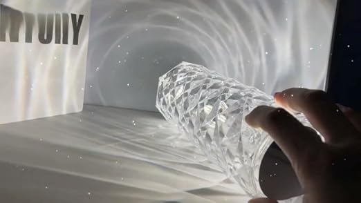 Leroxo portable crystal table lamp with 3-color touch control and rechargeable battery, featuring a sleek crystal design.