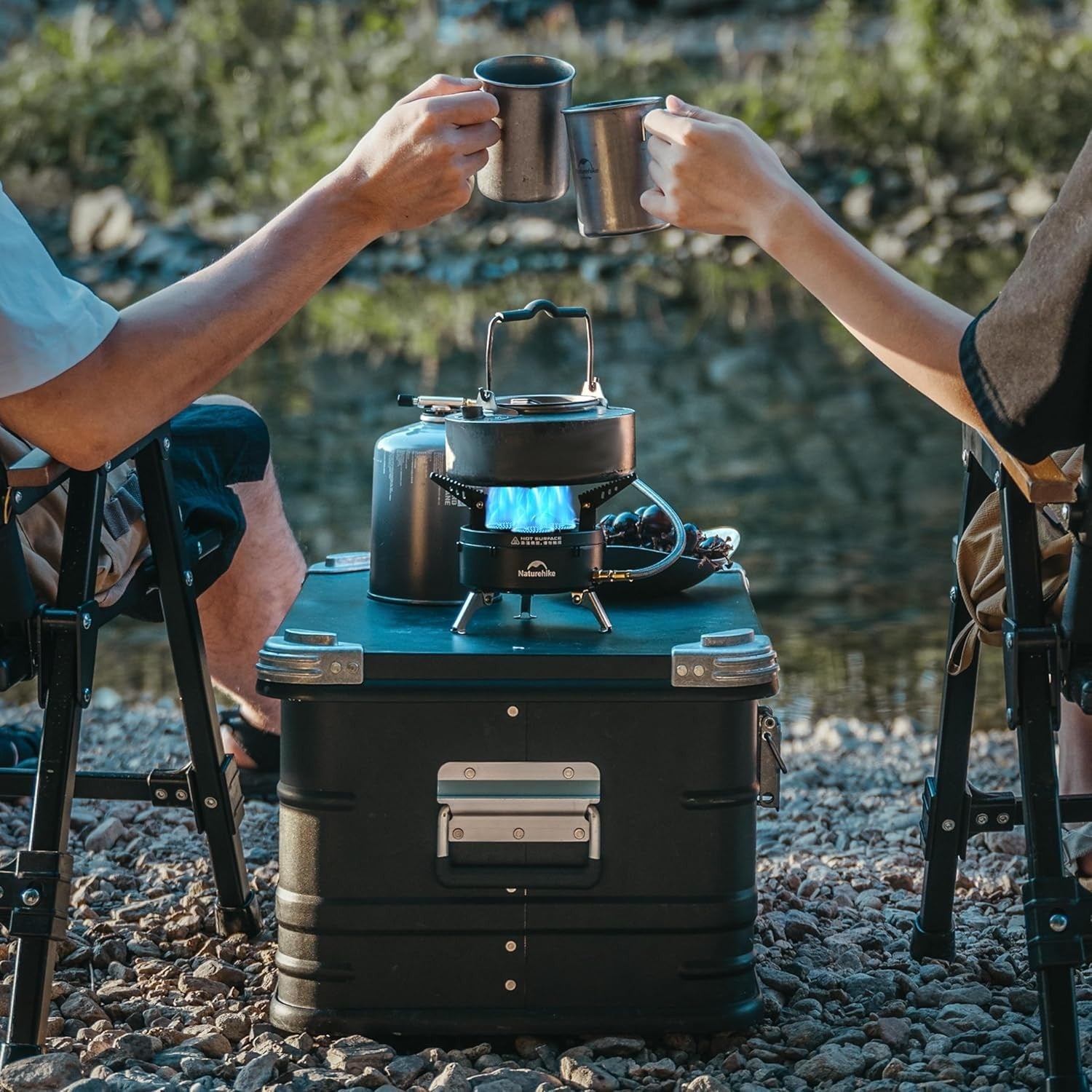 Naturehike IGT camping gas stove with portable isobutane fuel canister and 12000BTU burner for outdoor cooking.