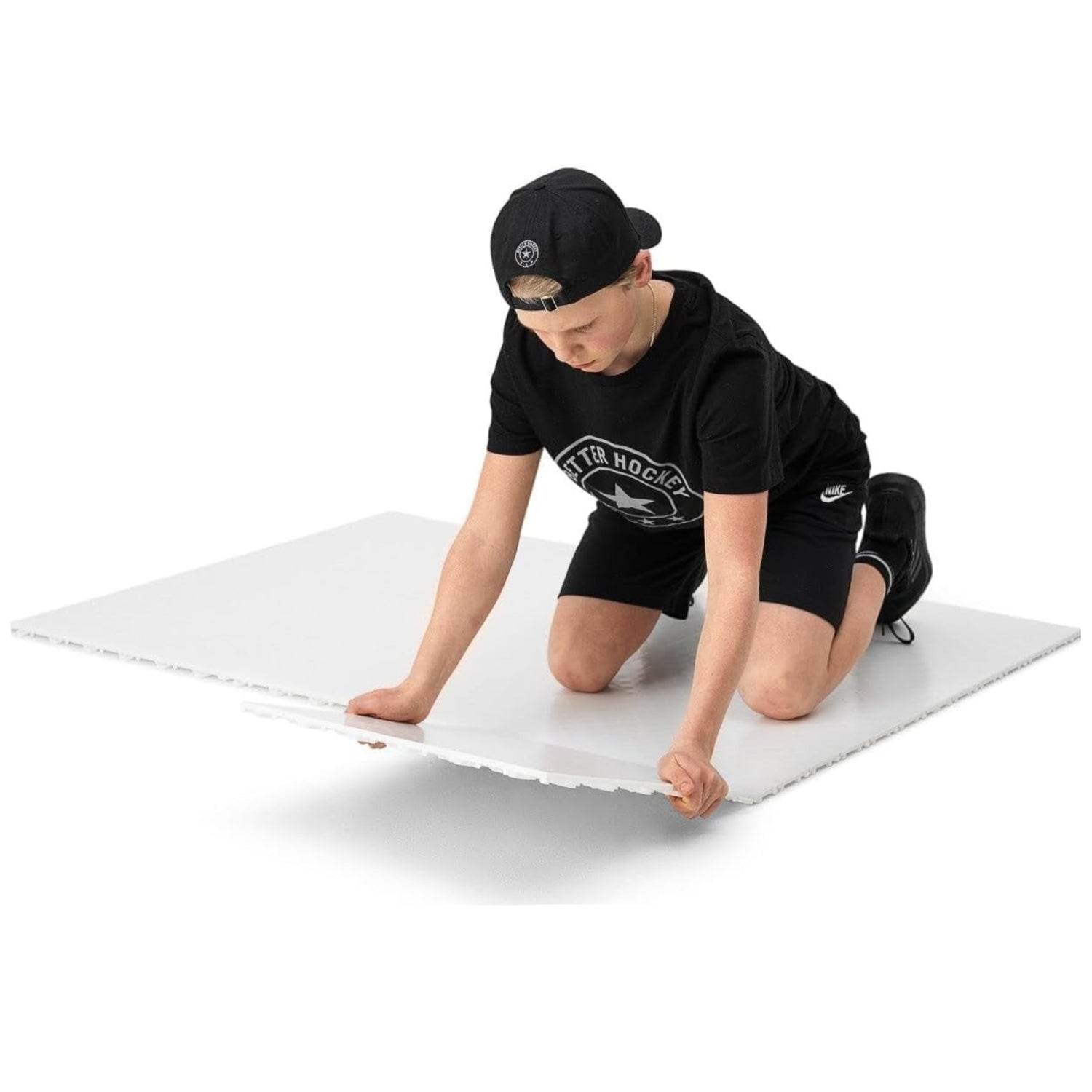 Better Hockey Extreme Dryland Flooring Tiles synthetic ice panels for hockey training, showing interlocking textured surface and edges.