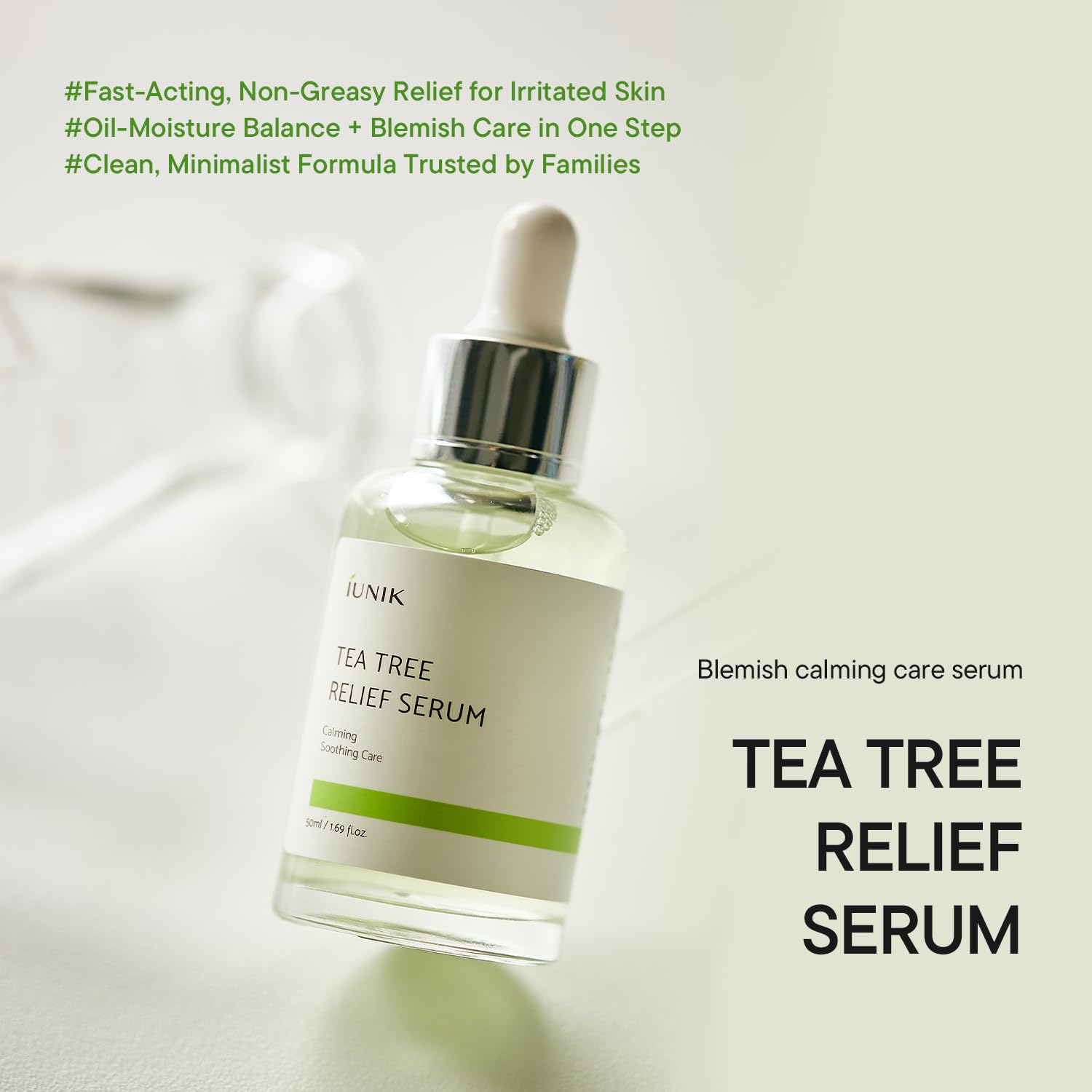 IUNIK Tea Tree Relief Serum Calming Ampoule bottle, featuring a clear glass container and dropper for skin soothing treatment.
