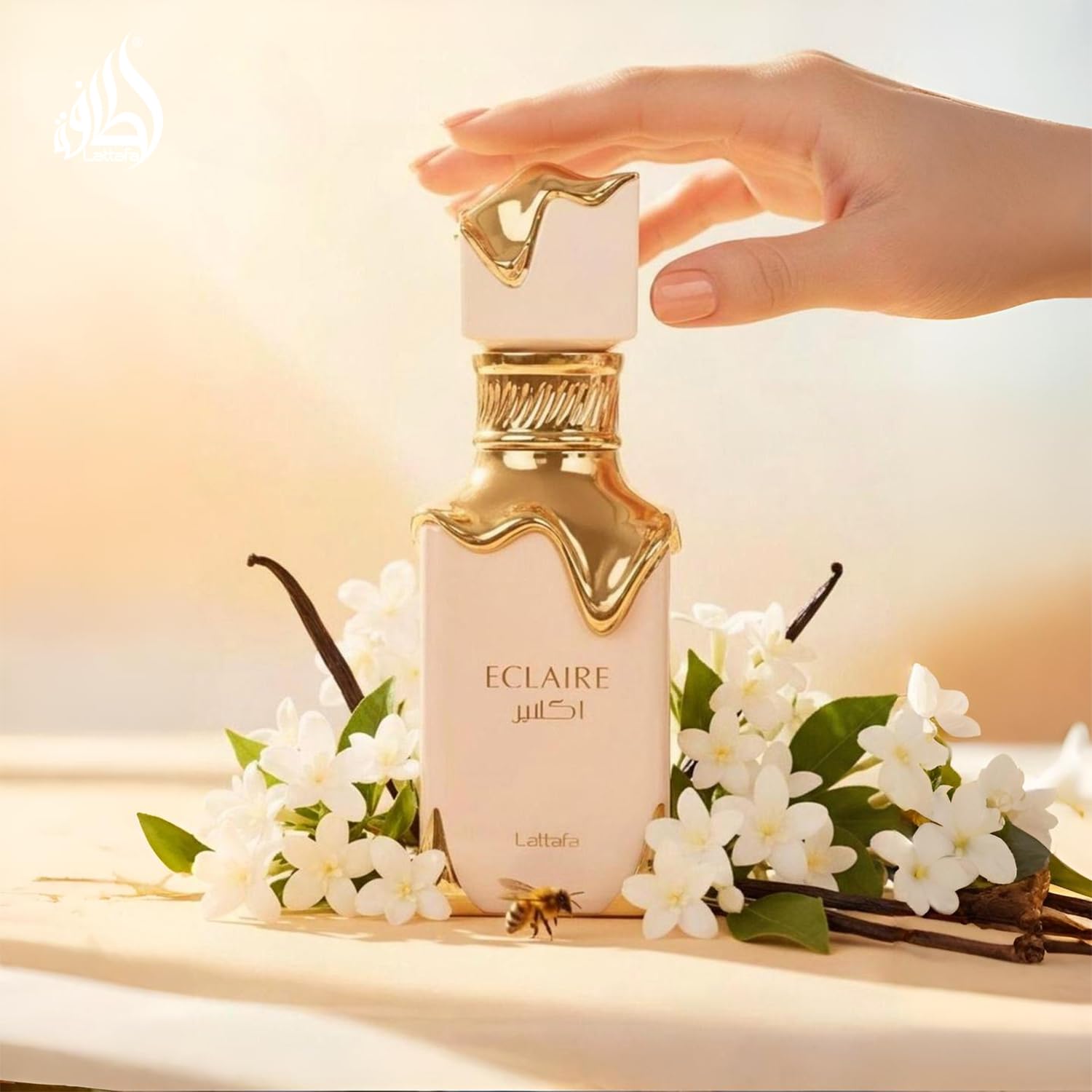 Lattafa Eclaire Eau de Parfum for women, 3.4 oz, featuring vanilla, caramel, floral notes, long-lasting sweet fragrance.