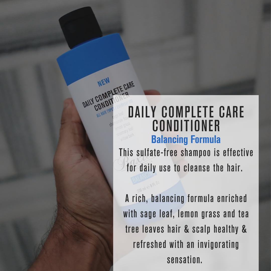 Baxter of California Daily Complete Care Conditioner bottle, 16 ounces, with sleek design and product label visible.