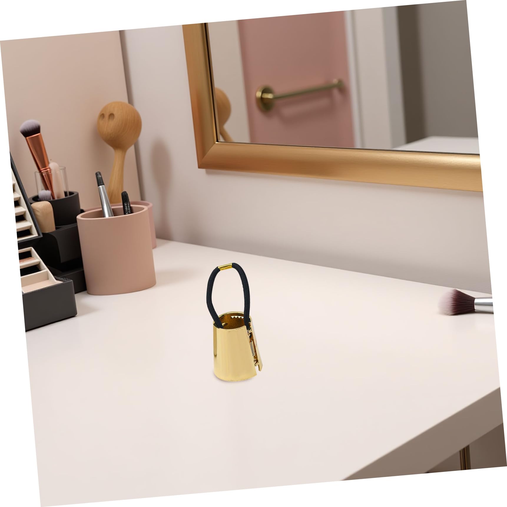 Gold PLAFOPE metal hair tie, a stylish elastic ponytail holder for everyday use and hair styling.