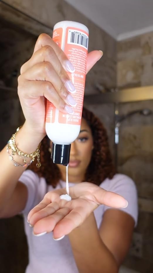 Camille Rose Guava Slip Detangling Conditioner bottle with guava and kakadu plum ingredients, designed for smooth, manageable hair.