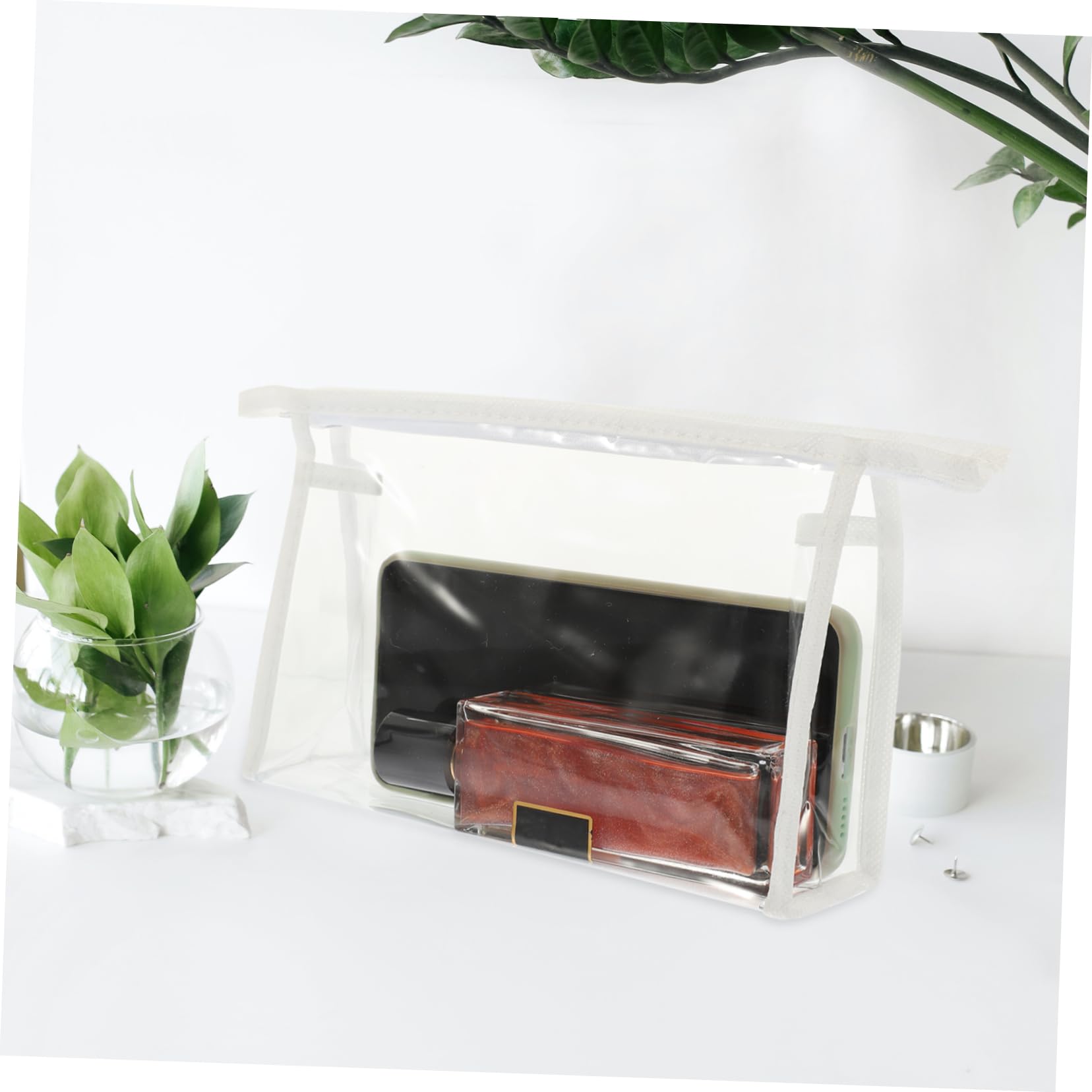 White EXQUIMEUBLE 4-piece travel skincare and toiletry bag set in a stylish cosmetic case with multiple compartments.