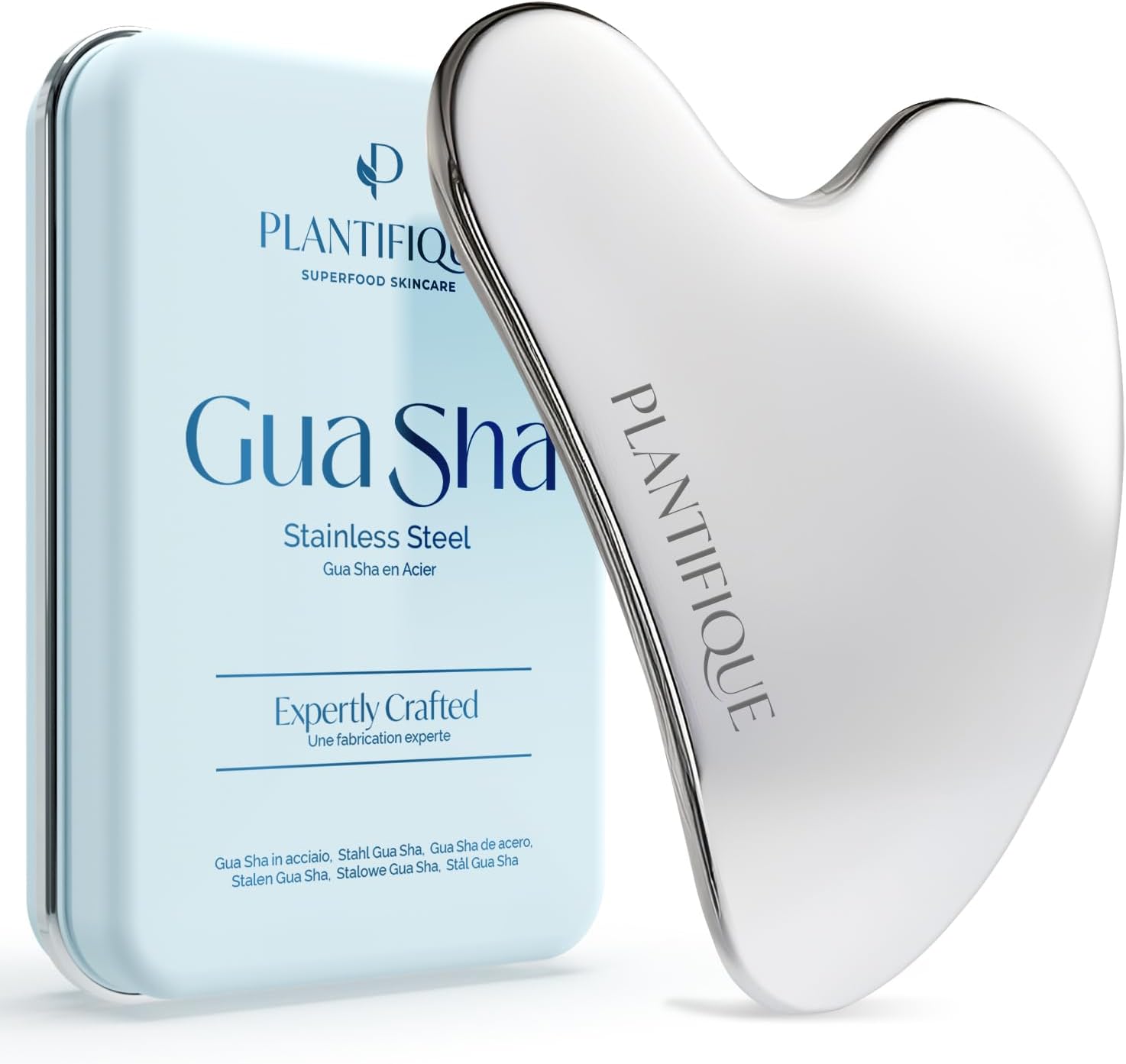 PLANTIFIQUE facial ice roller and stainless steel Gua Sha set for skincare, showcasing the tools on a clean surface.