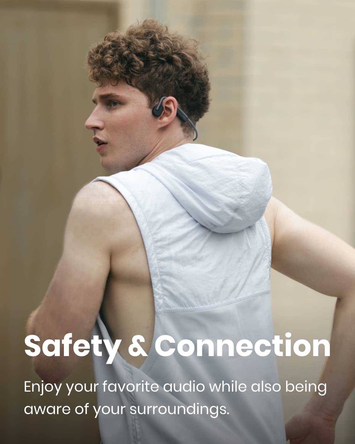 SHOKZ OpenMove open-ear Bluetooth sport headphones in grey with bone conduction design for running and workouts.