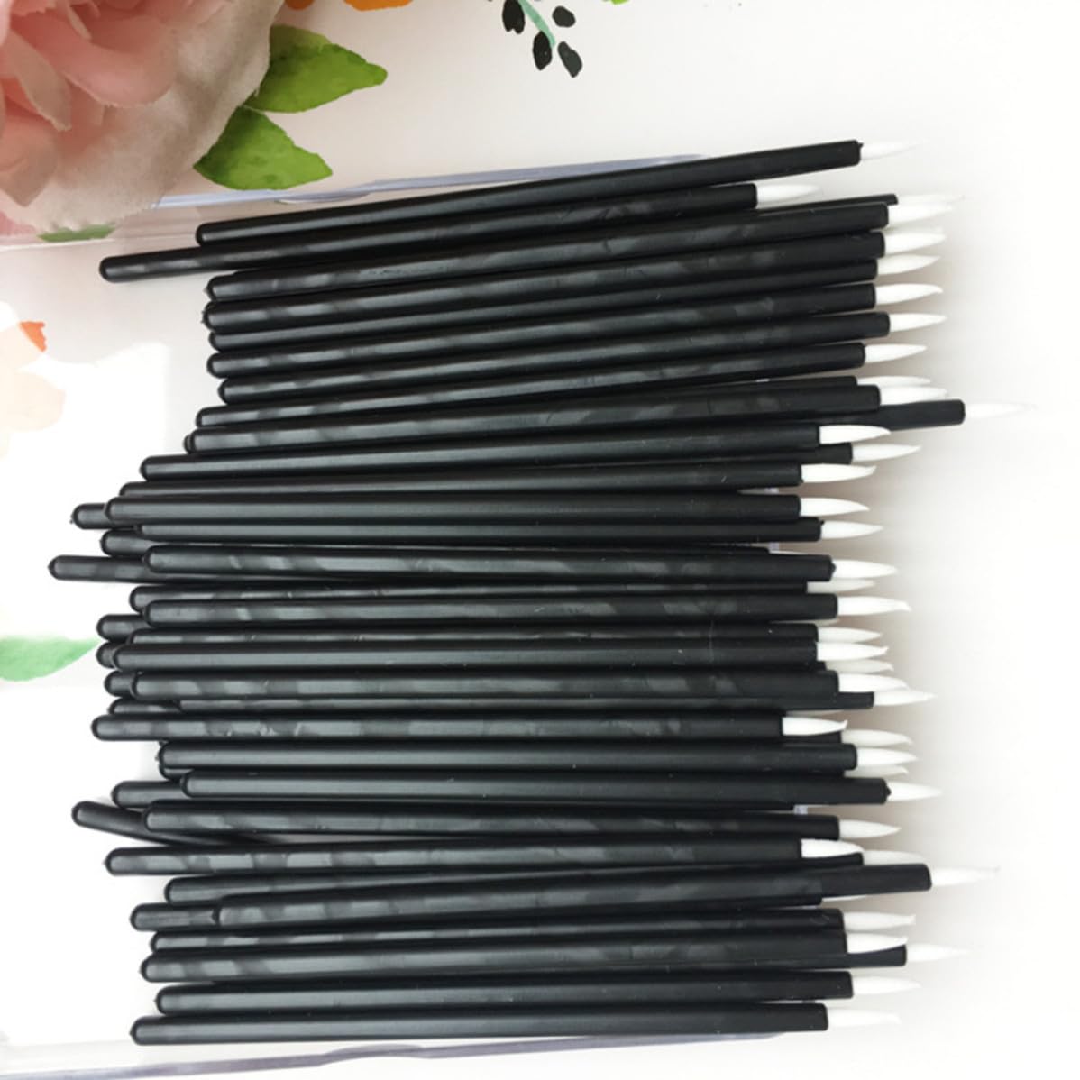 WOFASHPURET disposable eyeliner brushes set with 100 thin tip black cosmetic brushes for precise makeup application
