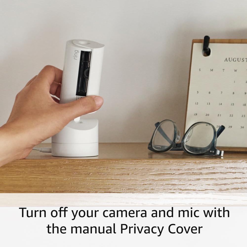 Ring indoor security camera with 360° pan, HD video, two-way talk, black color, designed for home or business surveillance.