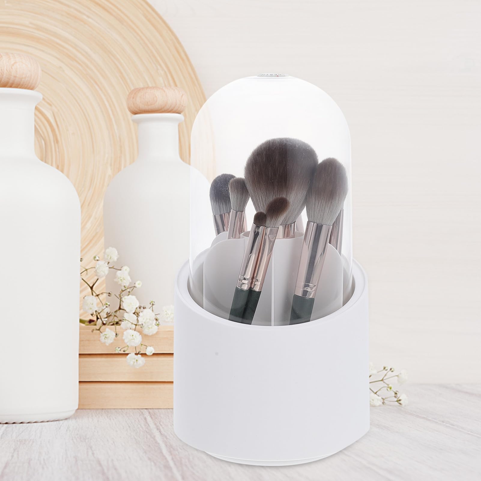 BEBEMOKO white rotating makeup brush holder caddy with 360° stand for organizing cosmetic brushes on a desktop.