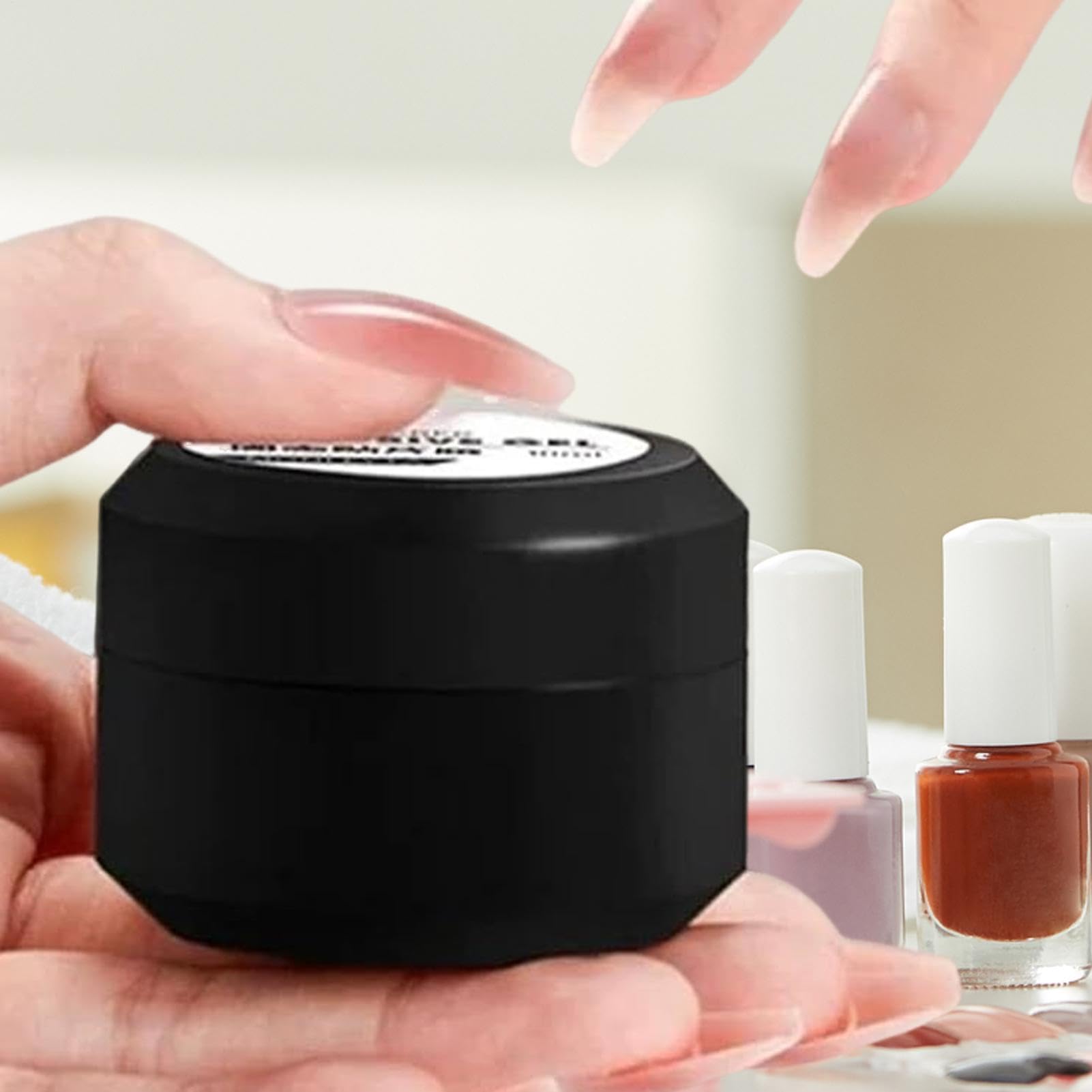 Guyuati Nail Adhesive Gel in 10ml, strong hold bonding gel for press-on and faux nails, clear and easy to apply.