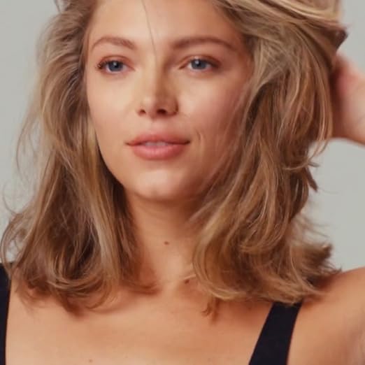 Elefair R+Co BLEU Root Booster volume spray for fine hair, showing the spray bottle with a sleek design and clear label.