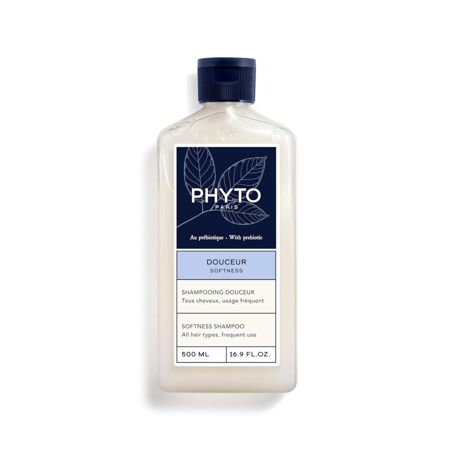 Bottle of PHYTO SOFTNESS Shampoo with botanical ingredients, featuring a sleek white and green design on a clean background.