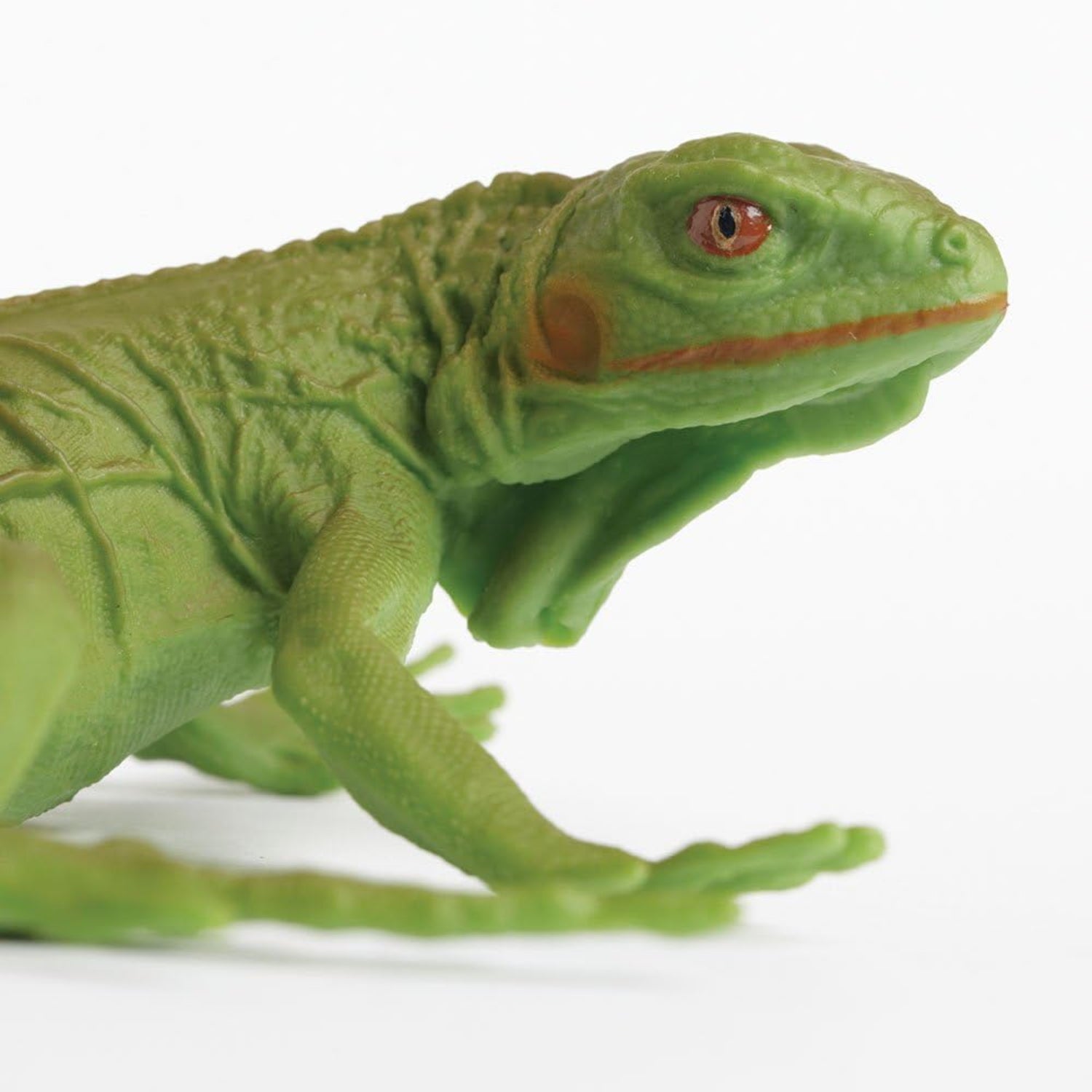 Safari Ltd. Iguana Baby figurine, a detailed 9.4-inch plastic model toy for educational play and display.
