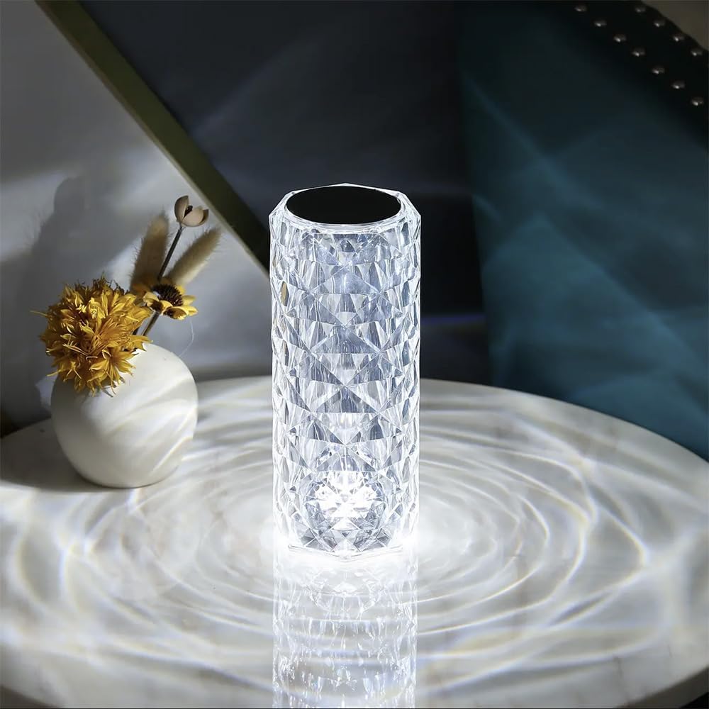 Portable Leroxo crystal table lamp with touch control, rechargeable with three color options, elegant lighting for home decor.
