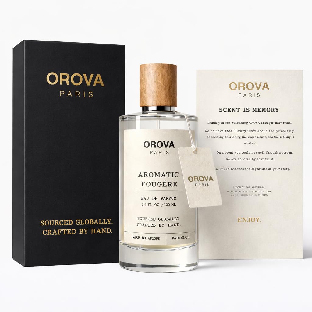 ORÖVA Paris Elixir Eau de Parfum bottle featuring strawberry vanilla gourmand scent, with elegant packaging and perfume sprayer.