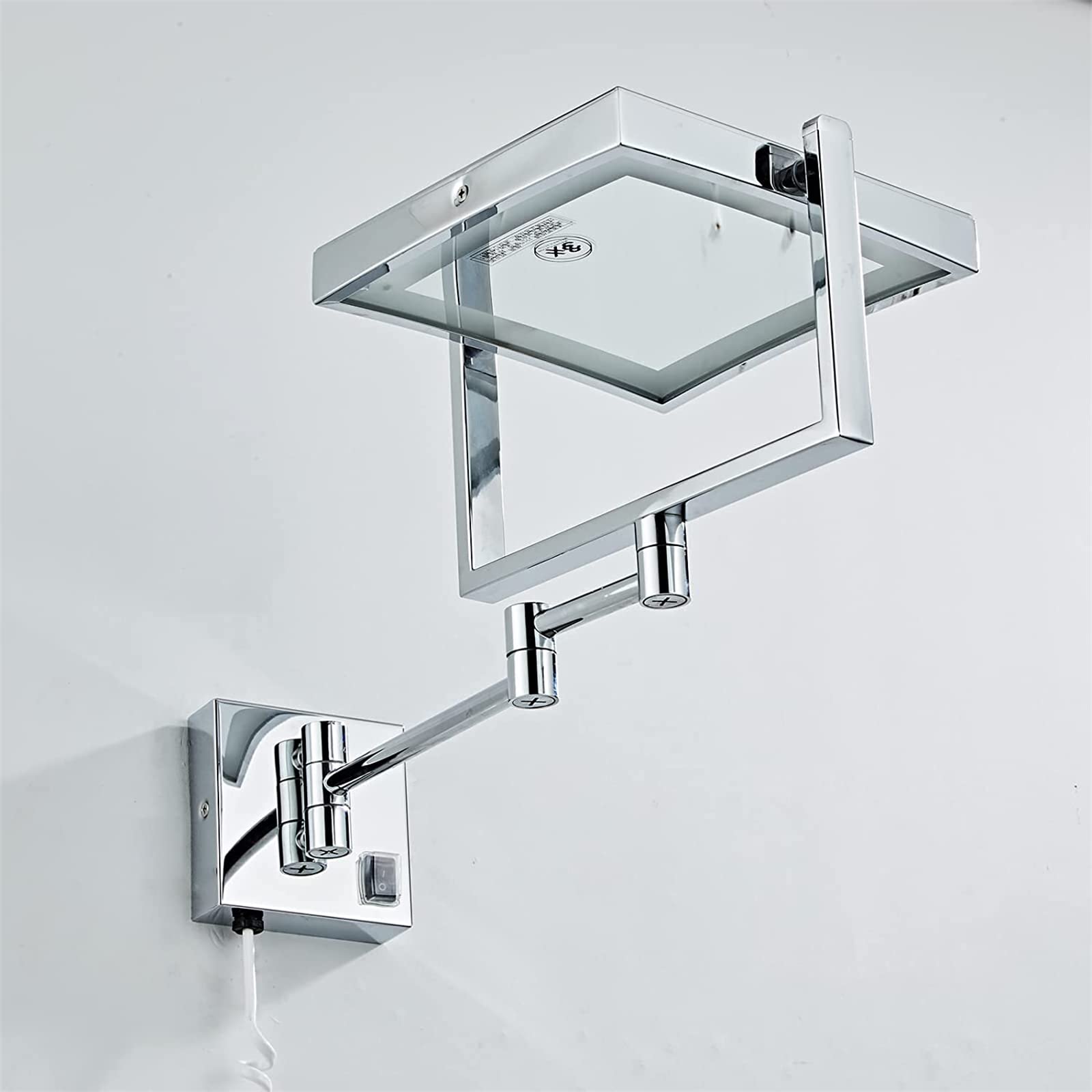 Brass wall-mounted LED makeup mirror with 360° rotation, double-sided 1x/3x magnification, suitable for bathroom use.