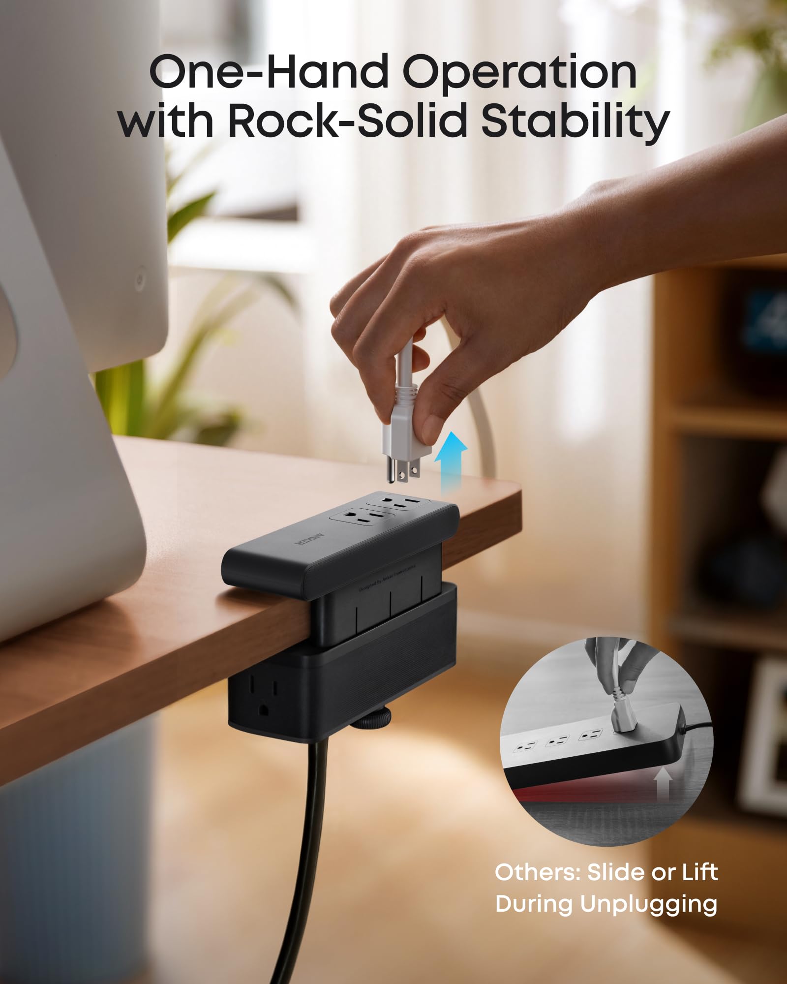 Anker Nano power strip with desk clamp, 70W max, 1500J surge protection, and two USB-C ports mounted on a desk surface.