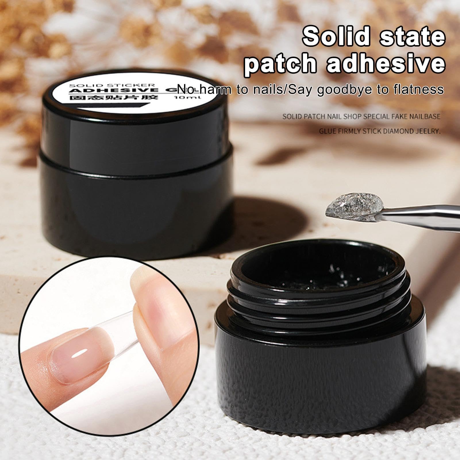 Guyuati Nail Adhesive Gel in 10ml for strong hold on press-on and faux nails, shown in a clear bottle with applicator.