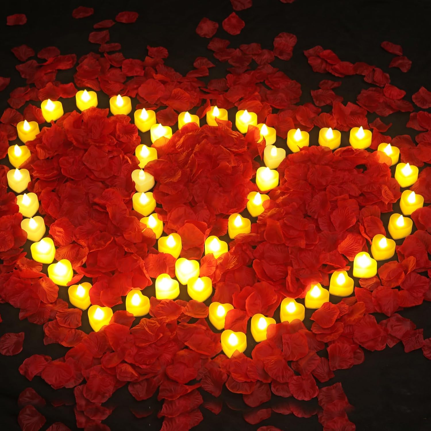 Set of 6000 artificial rose petals and 72 flameless candles from gobutend, ideal for romantic decorations and events.