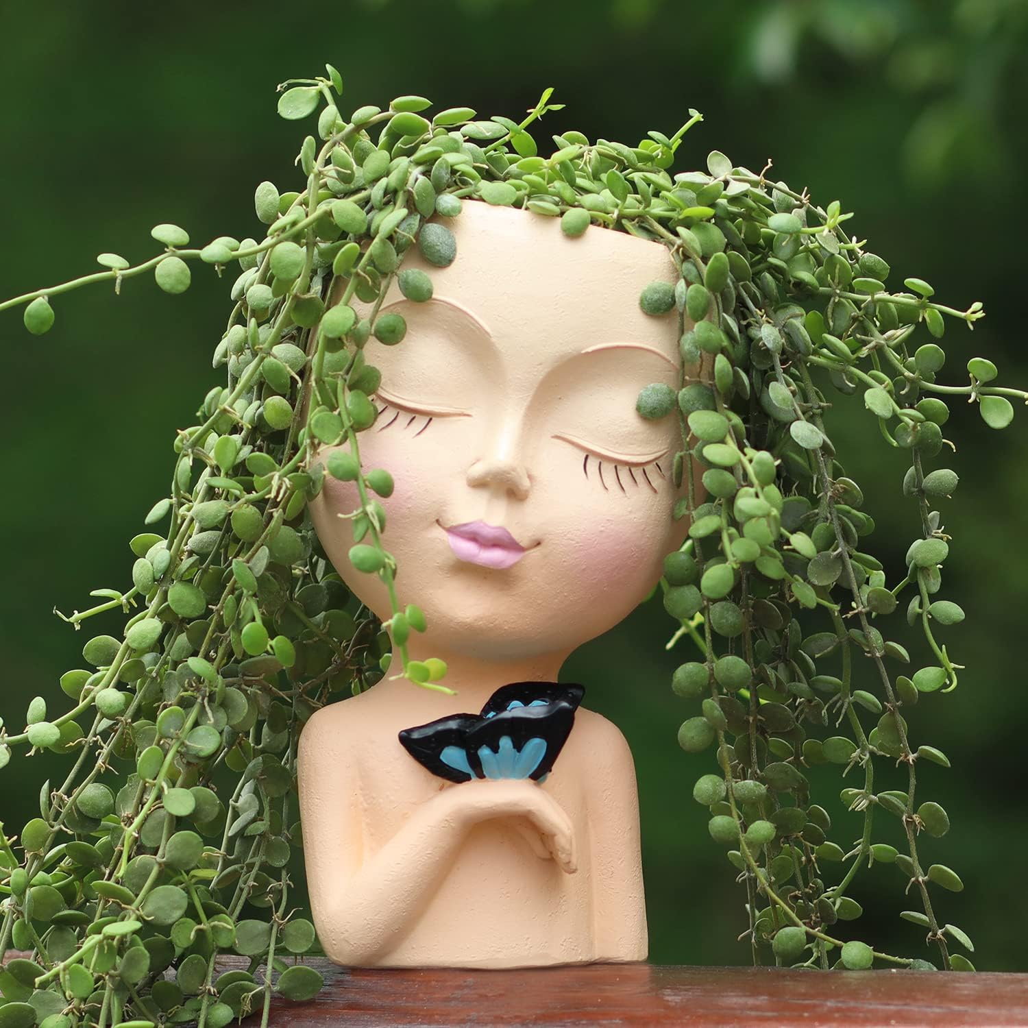 WEWEOW resin face planters for outdoor succulents, featuring cute lady face design with drainage holes for healthy plants.