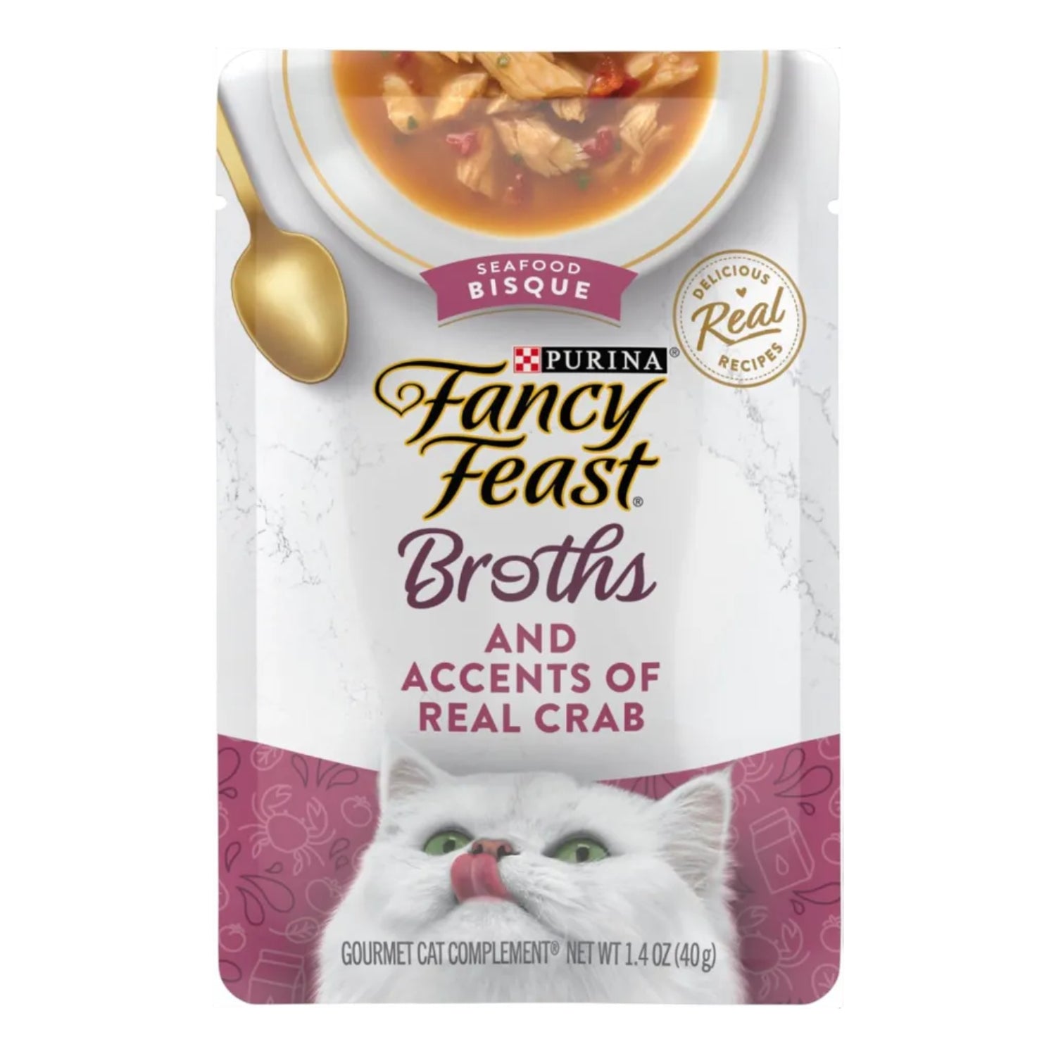 Fancy Feast Lickable Wet Cat Food Broth Topper in seafood bisque with accents, served in a clear dish for cats.