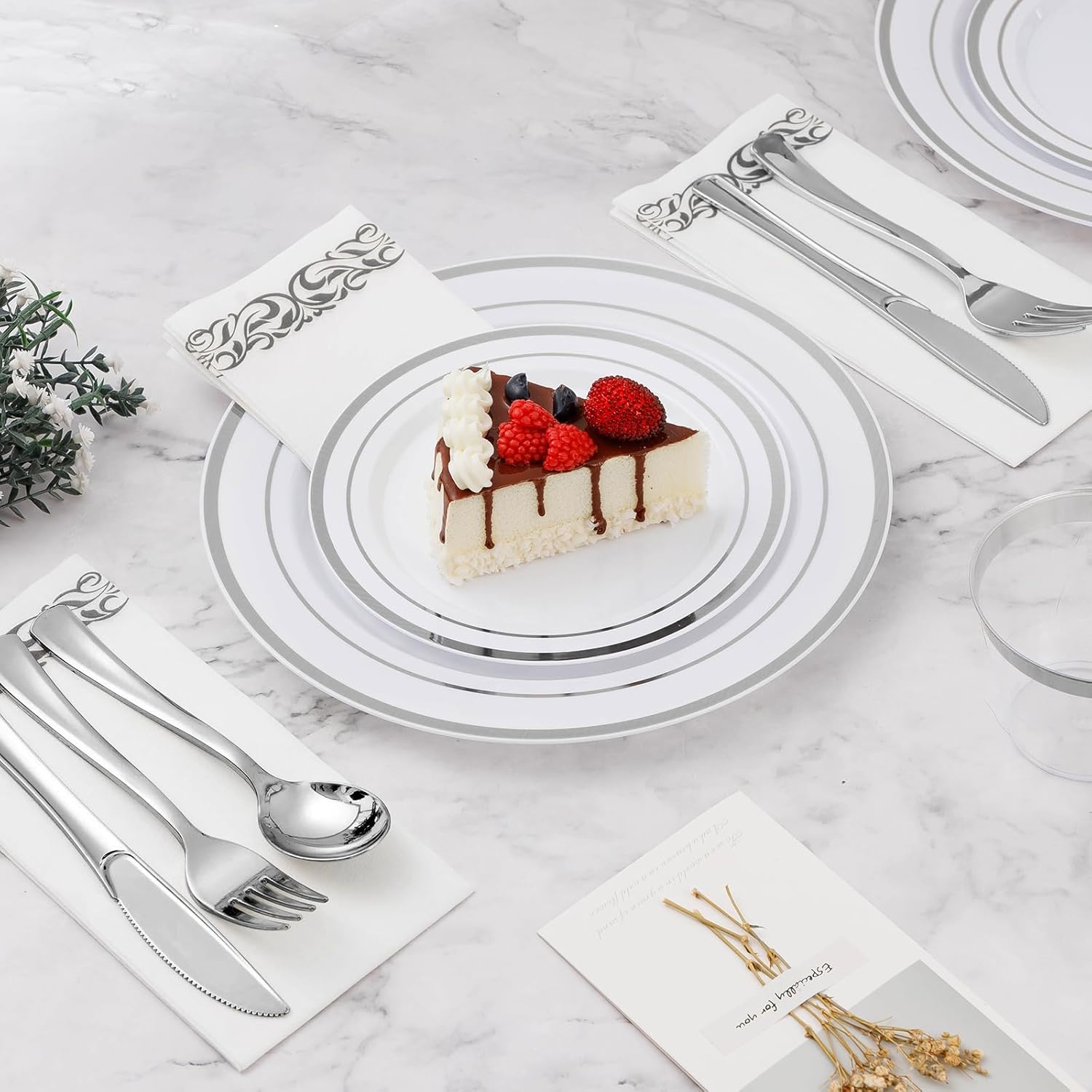 BESTVIP 700-piece silver plastic dinnerware set for 100 guests, includes plates, cups, and utensils for large events