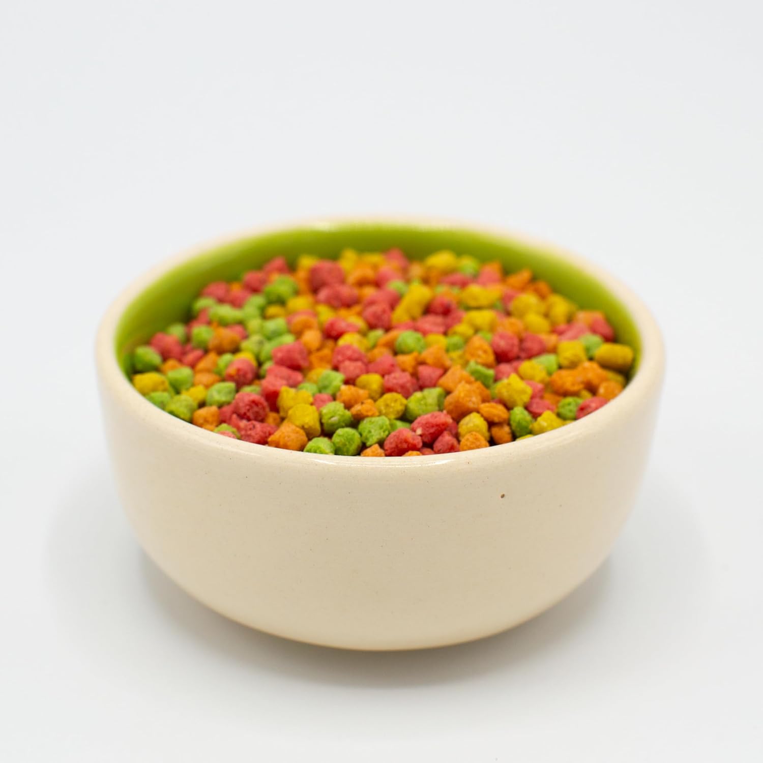Bowl of colorful cereal on a white background
