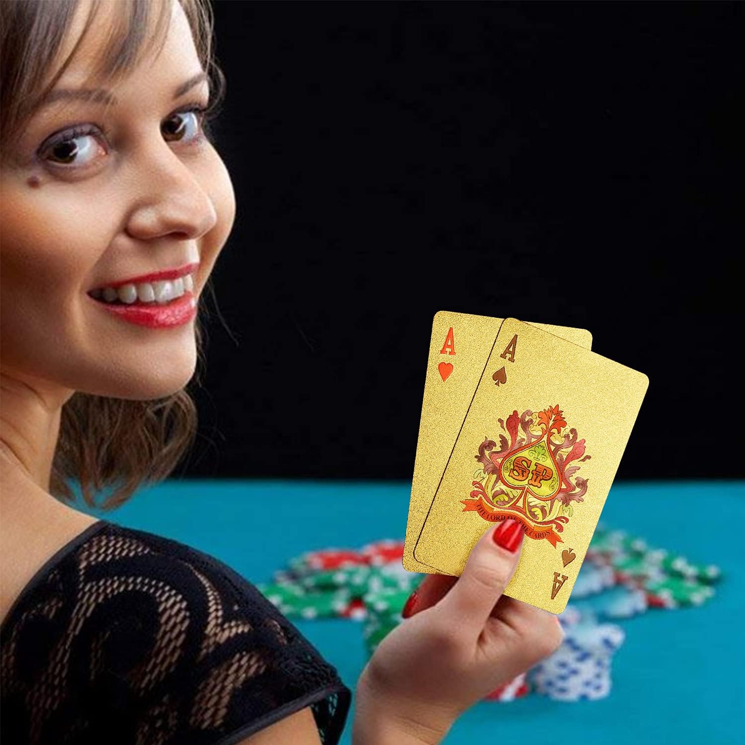EAY gold waterproof playing cards deck with intricate gold design on a white background