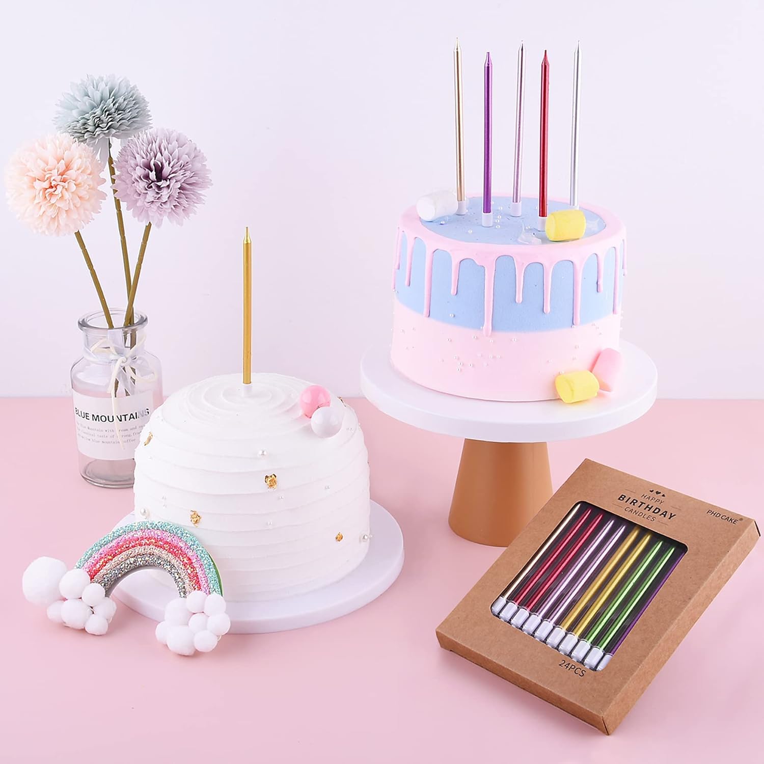 Gold long thin metallic birthday candles on a cake, PHD CAKE brand, perfect for celebrating special occasions