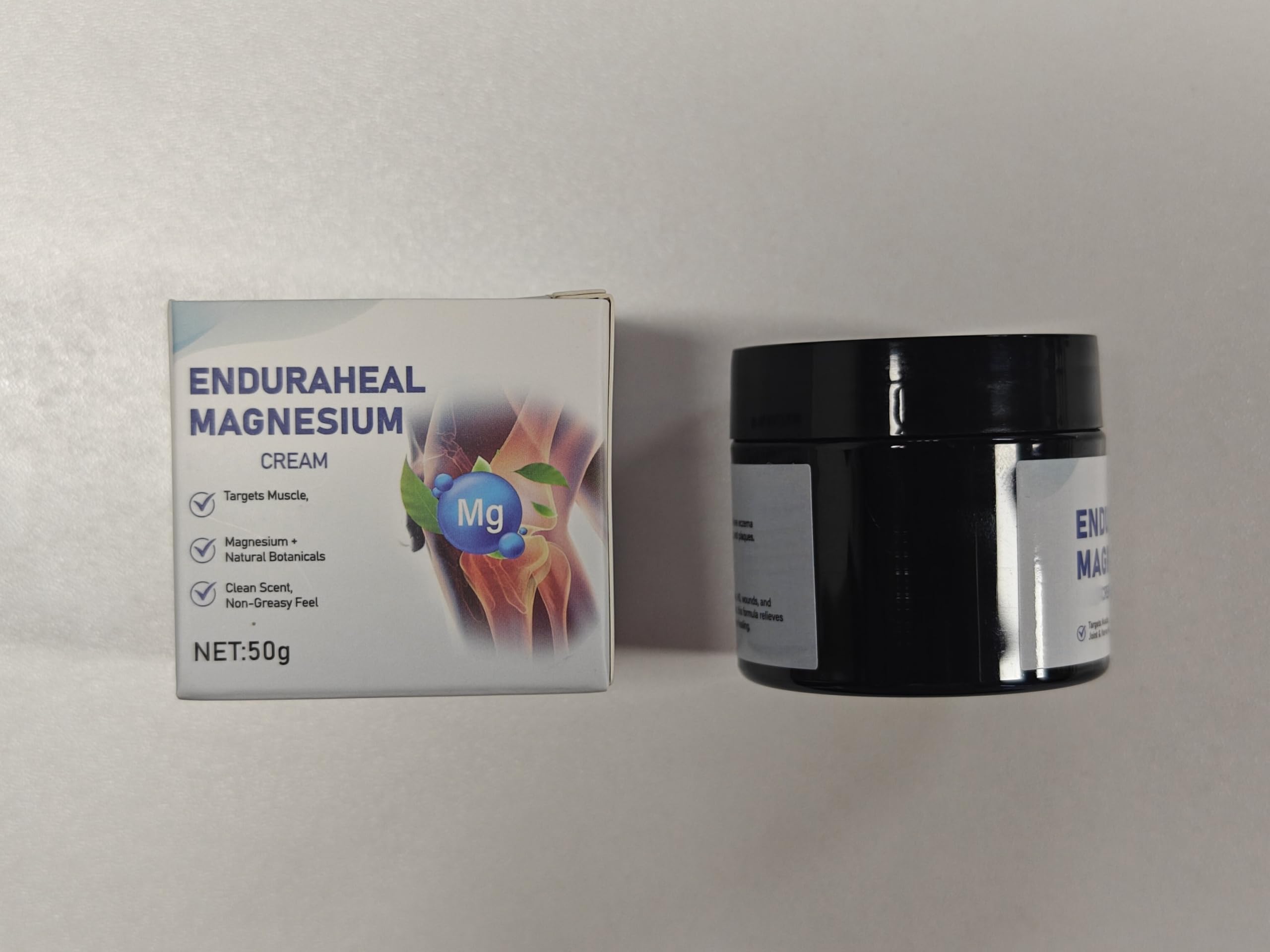 iYanoc EnduraHeal Magnesium Cream 2-pack, 50g skin moisturizer for joint relief, applied to skin for soothing and hydration.