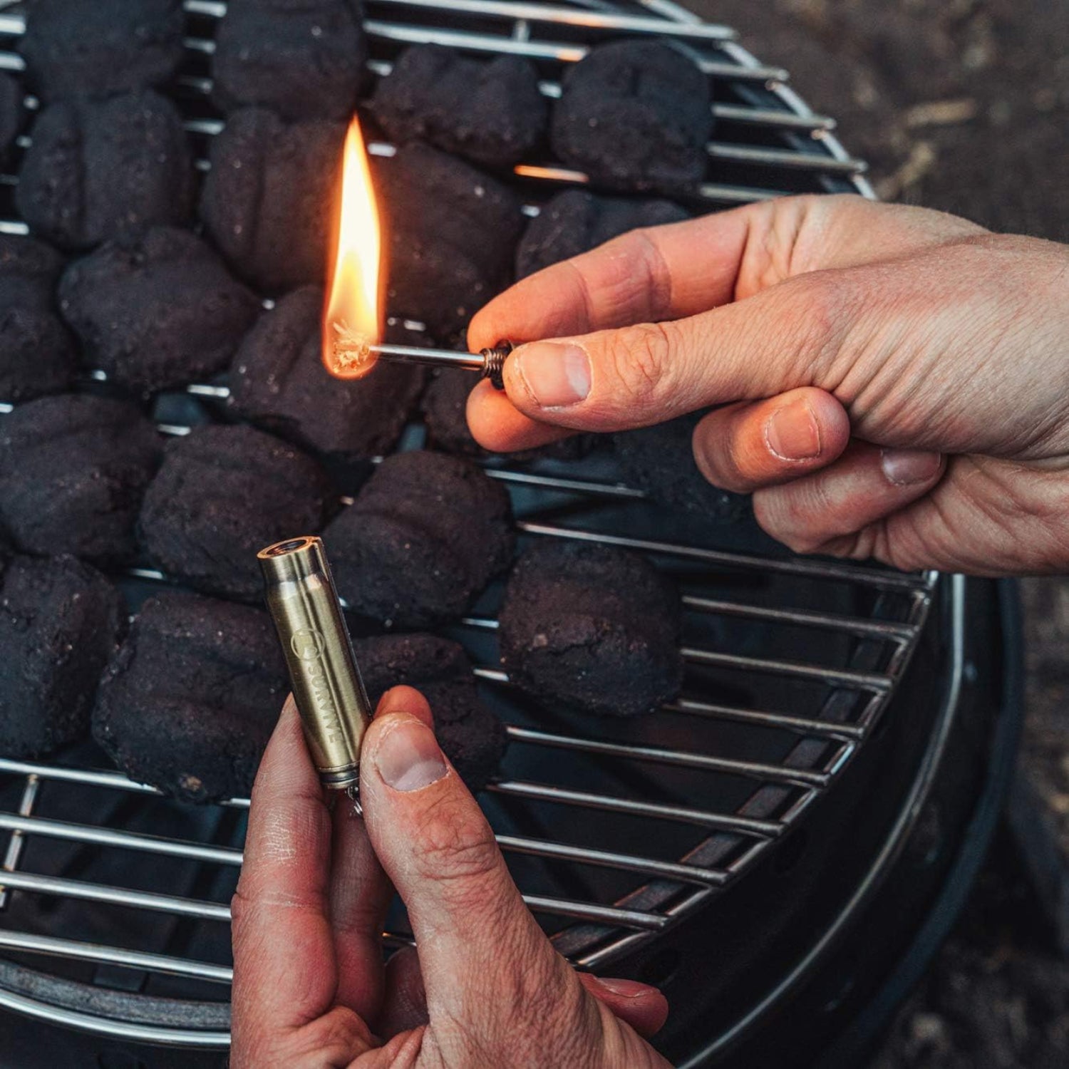 SURVIVE permanent match bullet keychain with metal quick clip, reusable survival fire starter and compact outdoor tool.