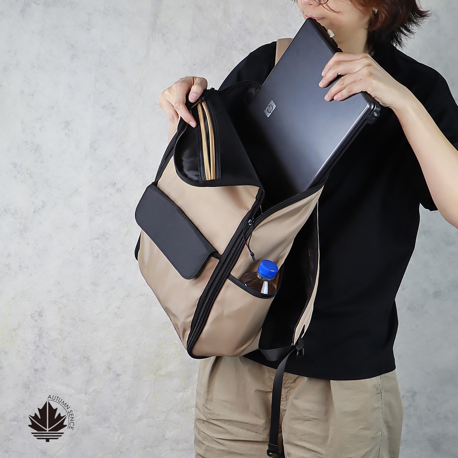 Autumn Sence khaki travel laptop backpack with large hanging toiletry organizer and water-repellent hygiene bag for on-the-go use.
