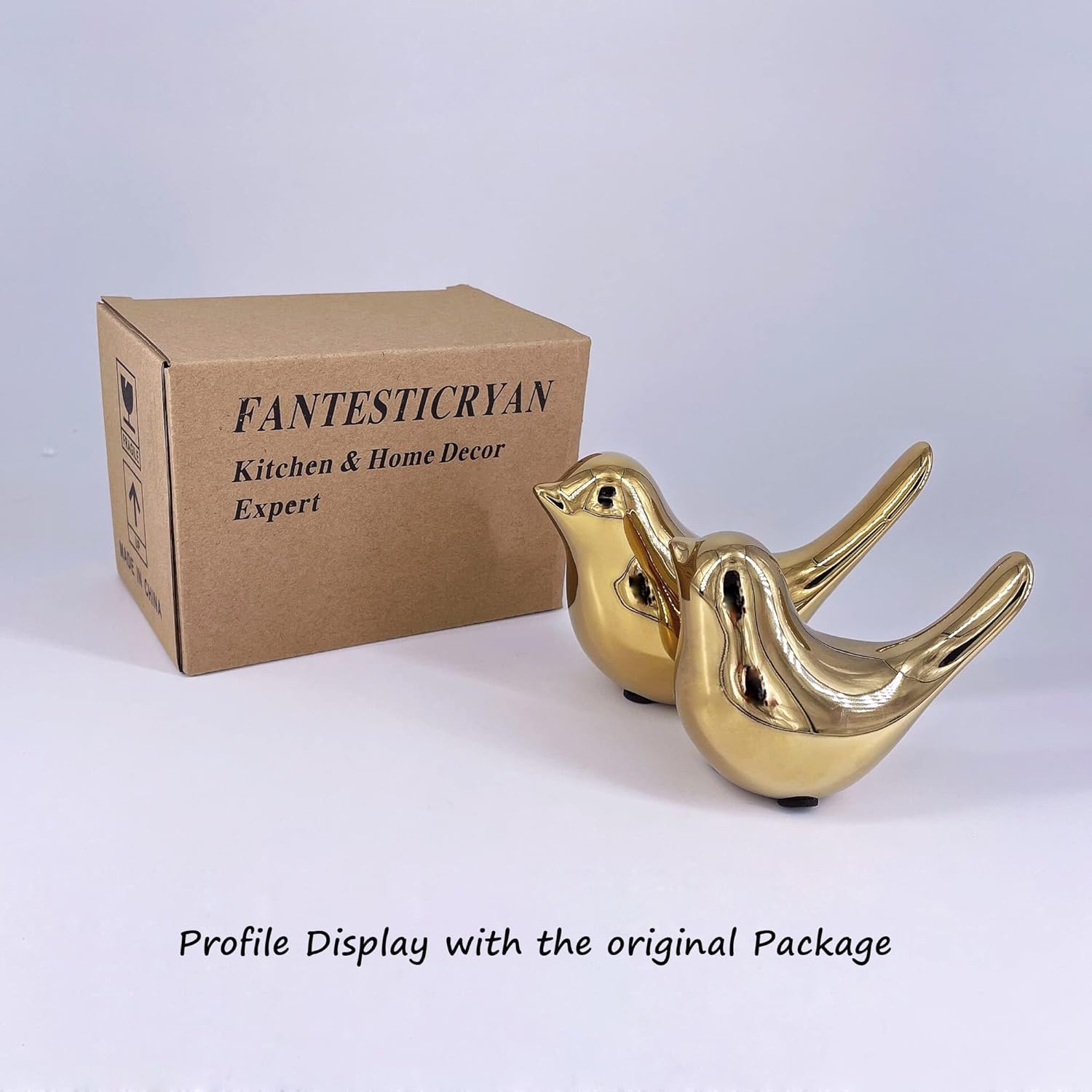 Small gold bird statues by FANTESTICRYAN for modern home decor, featuring detailed bird figures suitable for stylish interior accents.