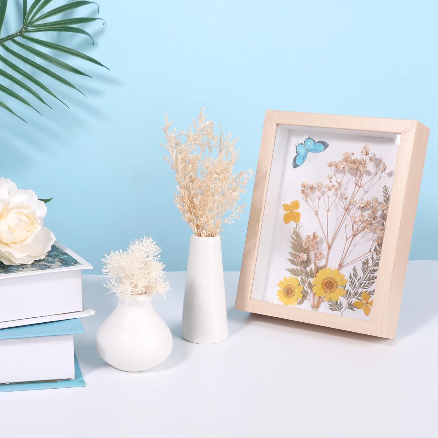 Comkrivy real dried flowers and mixed colored dried leaves, natural and preserved for decorative use, shown in the image.